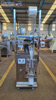 M�quina dosificadora y envasadora de productos granulados y en polvo.